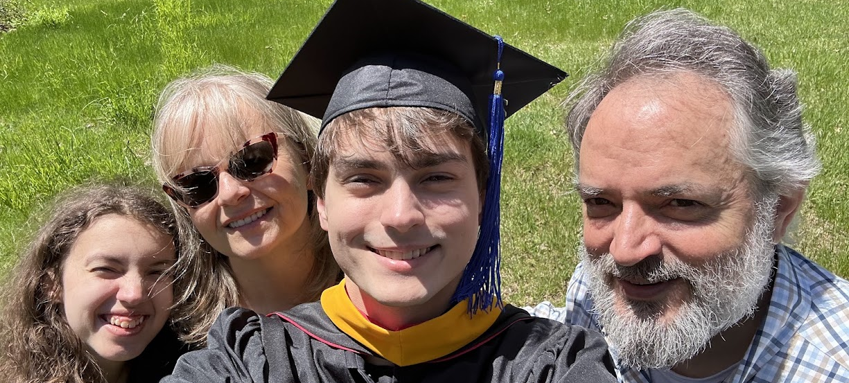 Jacob D. Preston graduation photo with family